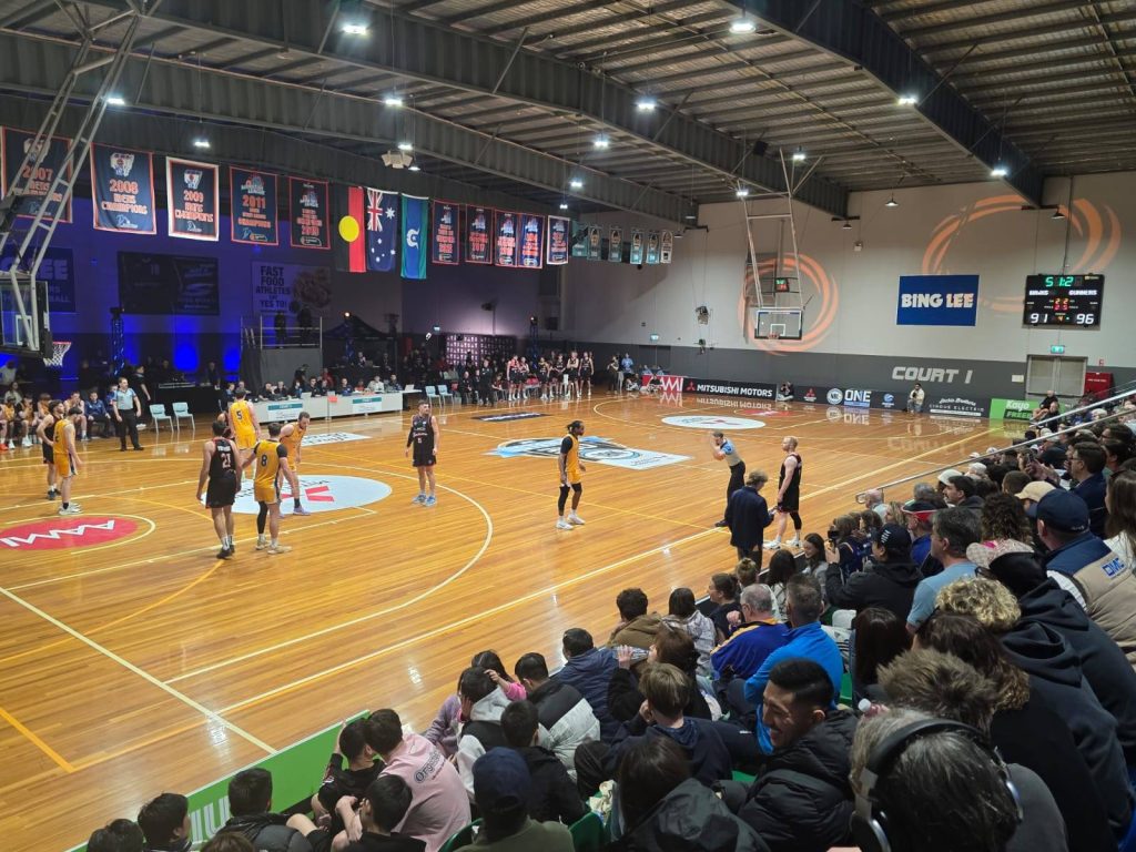 Players on court during a local basketball game